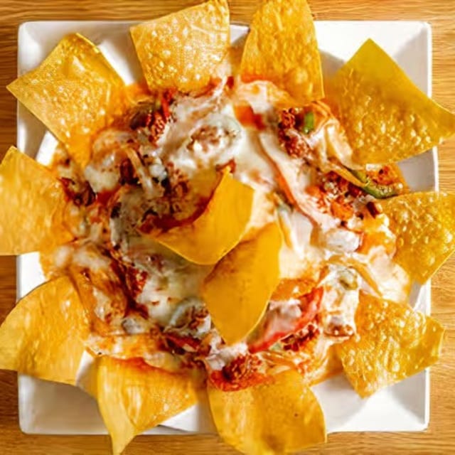 91. Queso Fundido with Mexican Sausage.